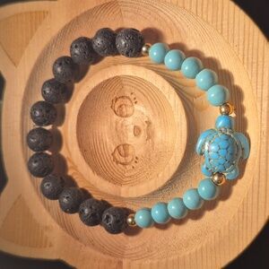 Magnesite with blue acrylic turtle and lava beads